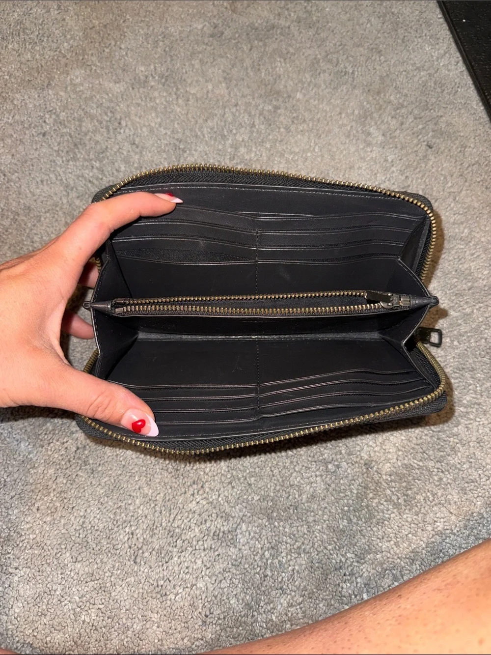 Coach black pebbled leather zip-around wallet